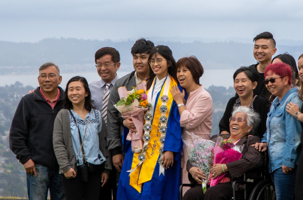 Family getting the photo taken at commencement.