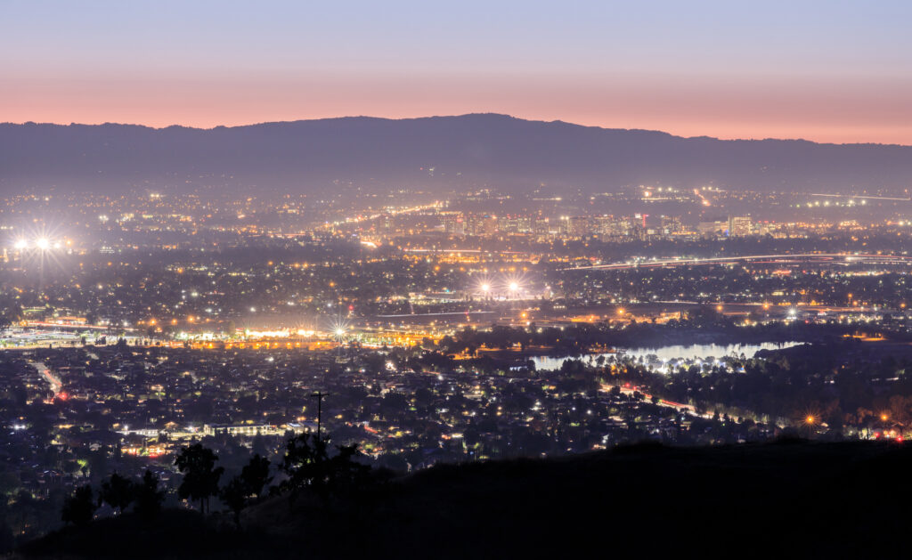 Silicon Valley at dusk with lots of lights.