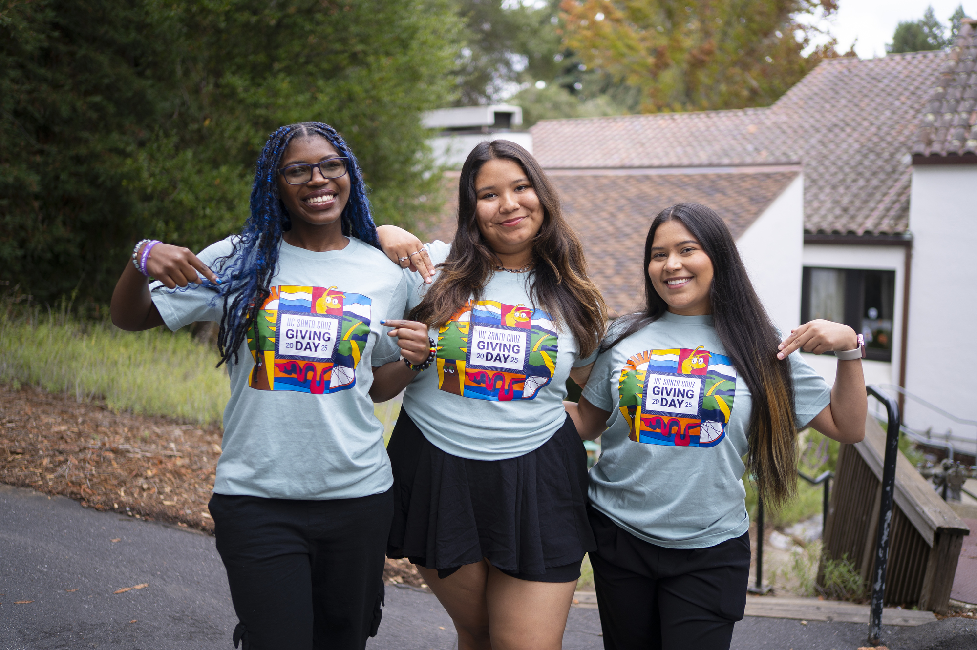 Students wear t-shirts that say "Giving Day"