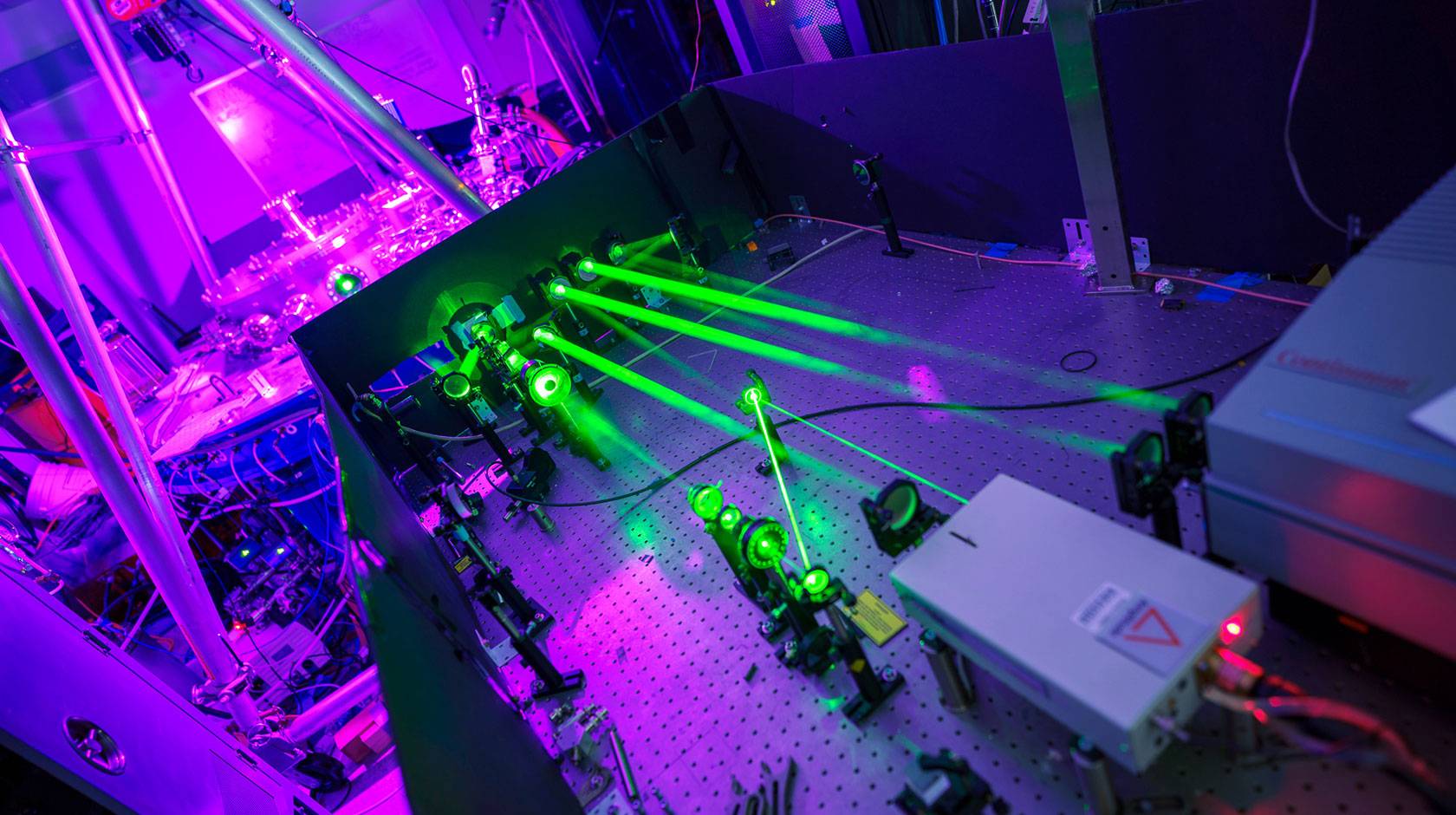 Green lasers beams in a machine