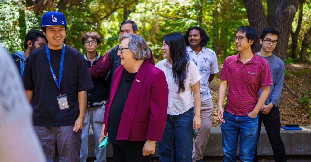 Chancellor walked with a group of students.