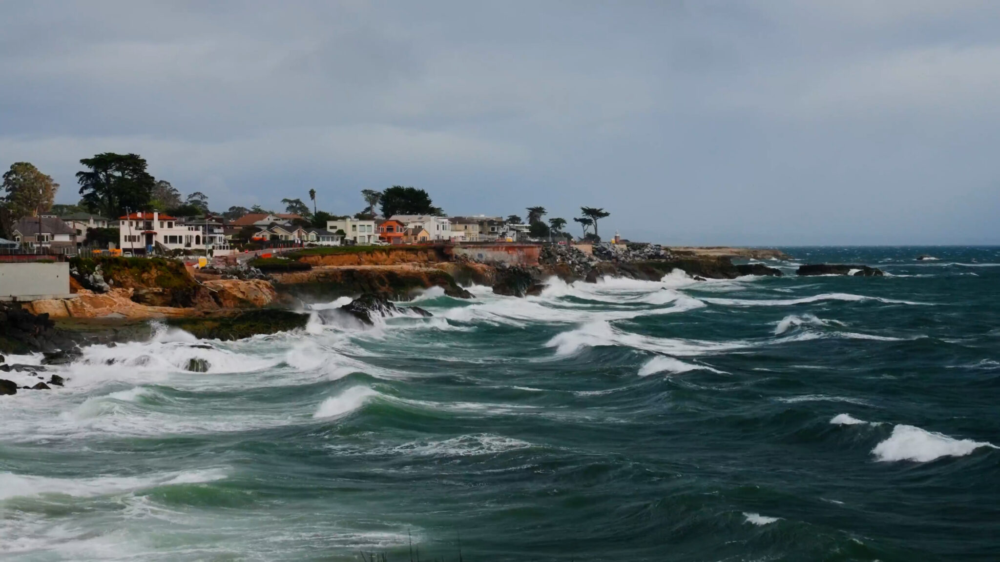 Waves hit the shore along West Cliff Drive in Santa Cruz. 
